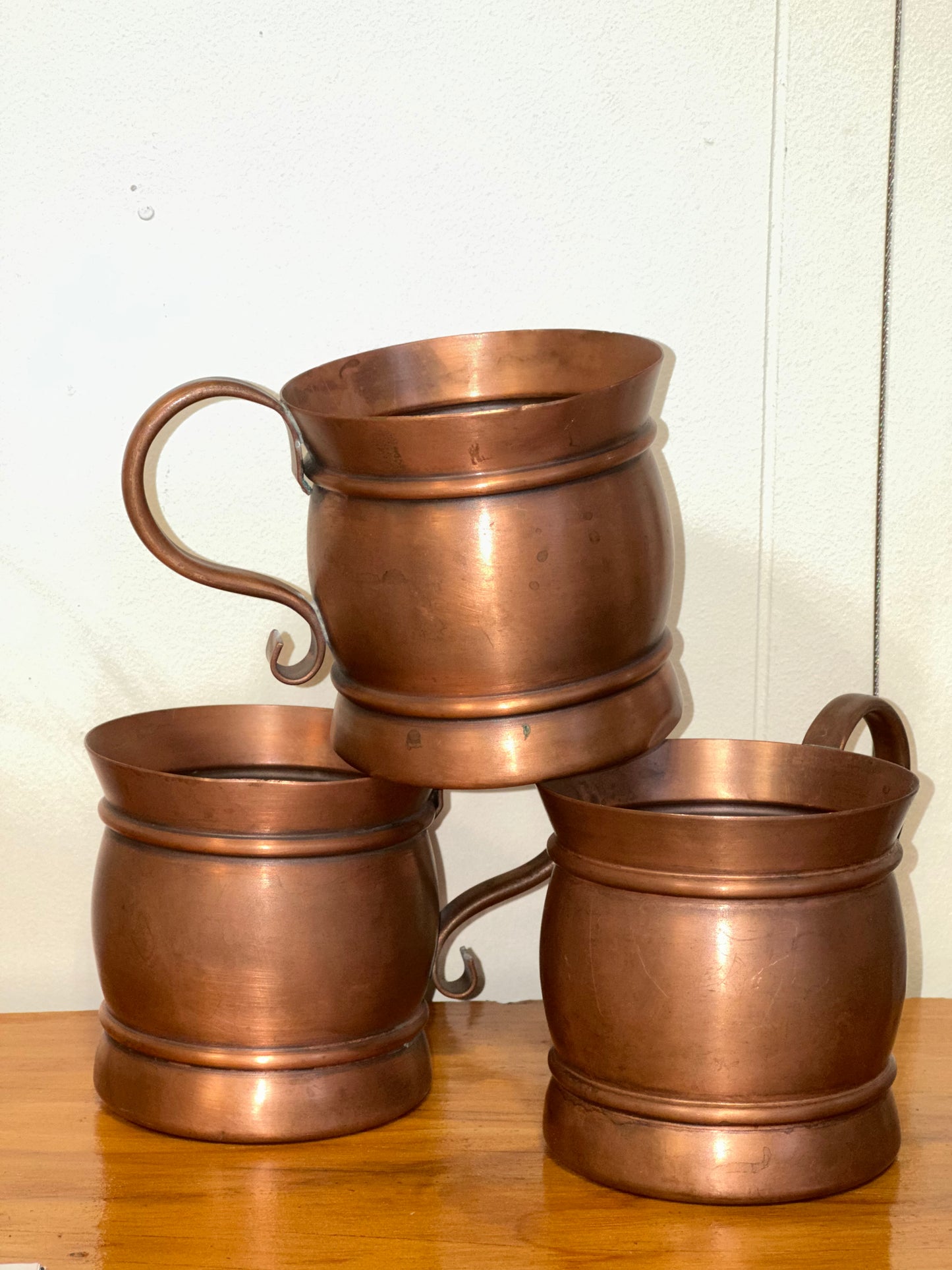 Set of vintage solid copper tankard mugs 