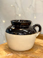Small burgundy and cream stoneware bean pot