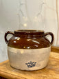Large two-handle stoneware bean pot with burgundy glaze and cream base