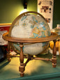 Vintage world globe with wooden stand