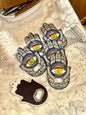 Hamsa hand mosaic bottle opener magnet with colorful eye design