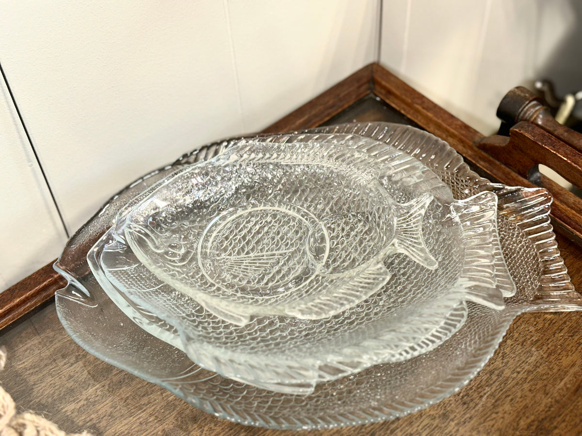 Detailed clear glass fish serving dishes