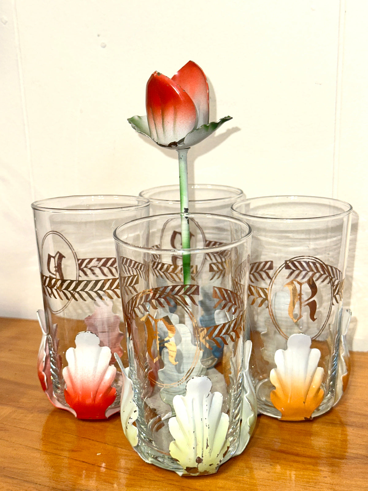 Close up of vintage floral glass decorations and metal holder
