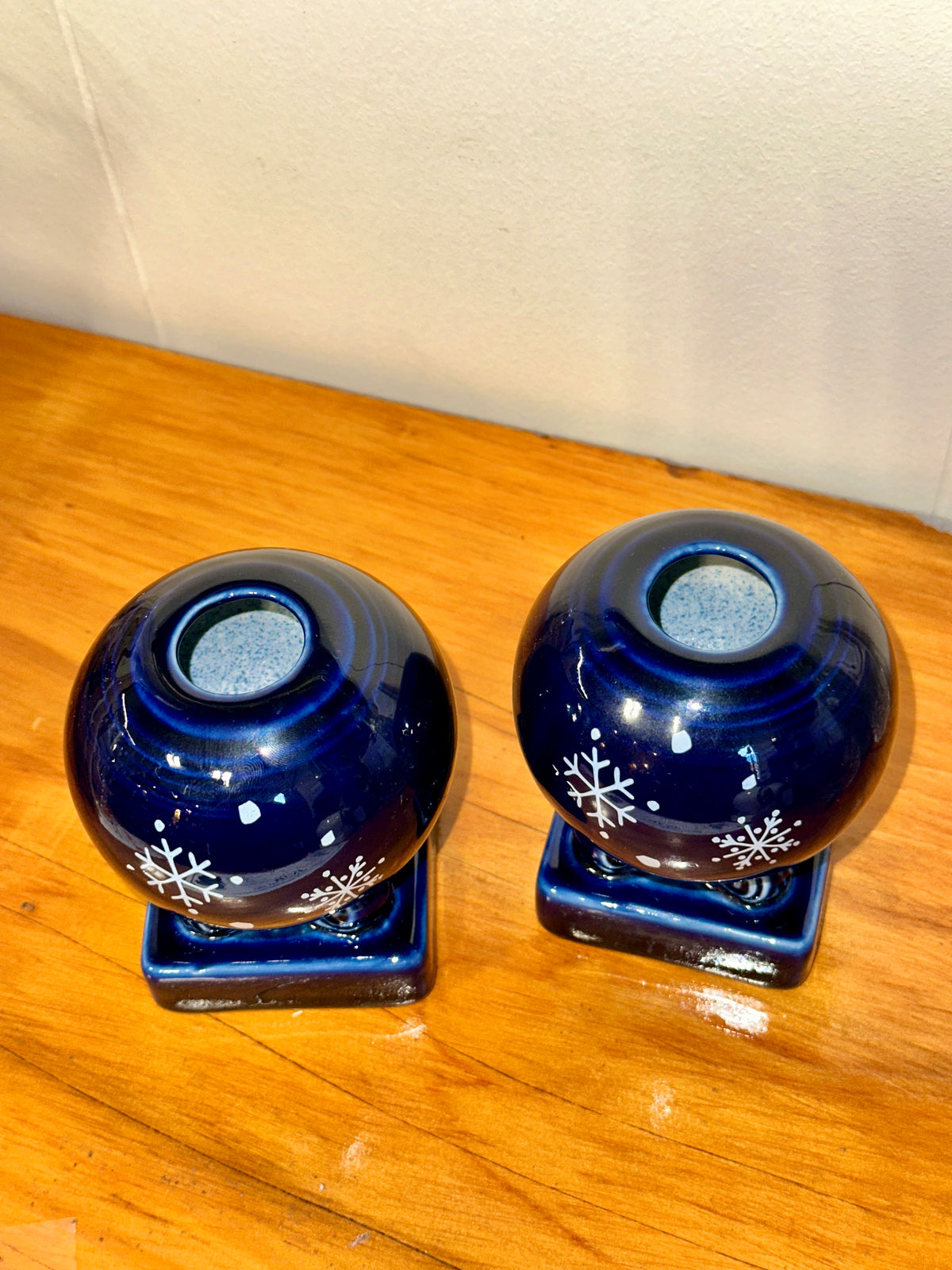Pair of vintage blue ceramic snowflake candle holders