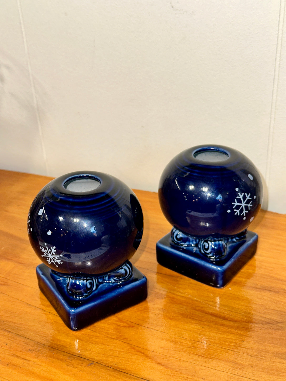 Blue ceramic holiday candle holder with decorative square base
