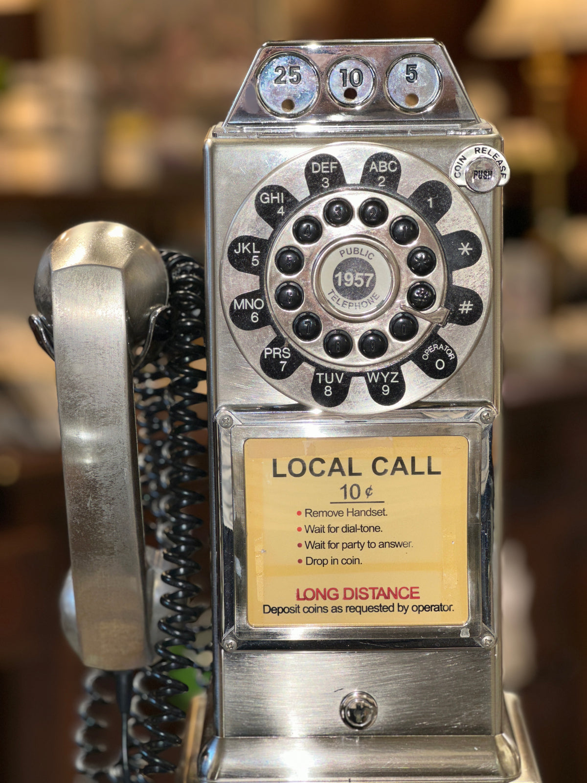 Retro metal payphone with 10 cent local call coin slots