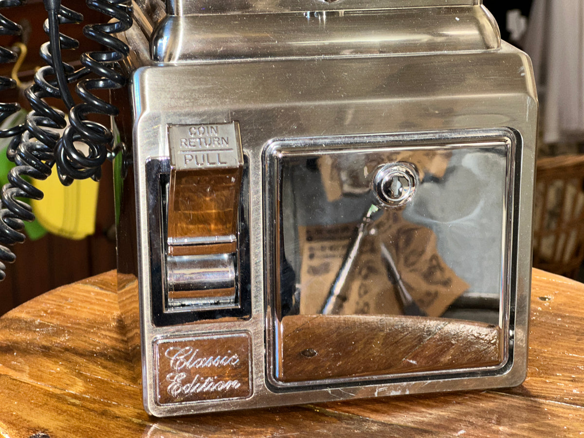 1957 style coin operated telephone with handset