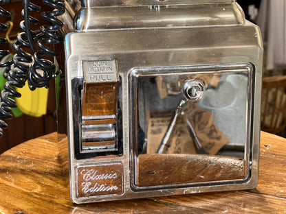 1957 style coin operated telephone with handset