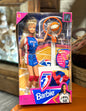 1998 Mattel WNBA Barbie basketball doll #20205 in original pink box with basketball hoop, ball, and blue and red uniform.