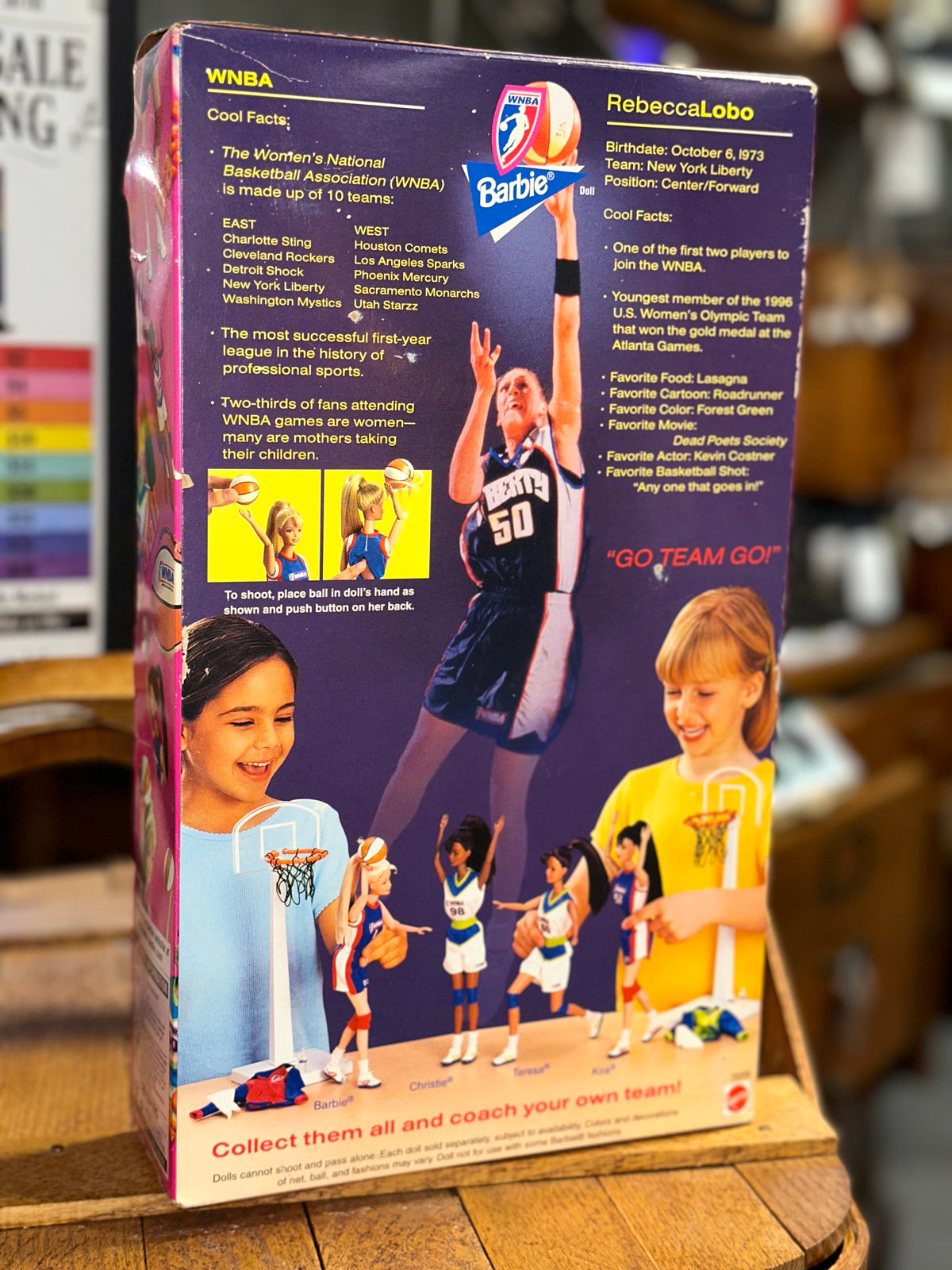 Close-up of the back and side of the 1998 Mattel WNBA Barbie box 