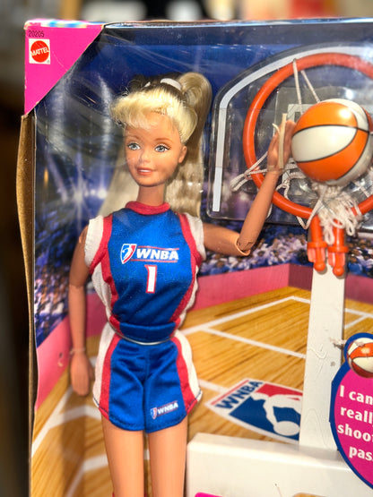 Side view of the original 1998 WNBA Barbie packaging showing basketball-themed graphics and product information.