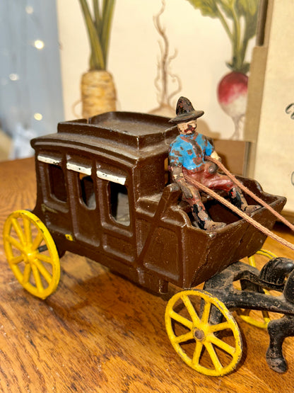 Side view of vintage brown stagecoach 