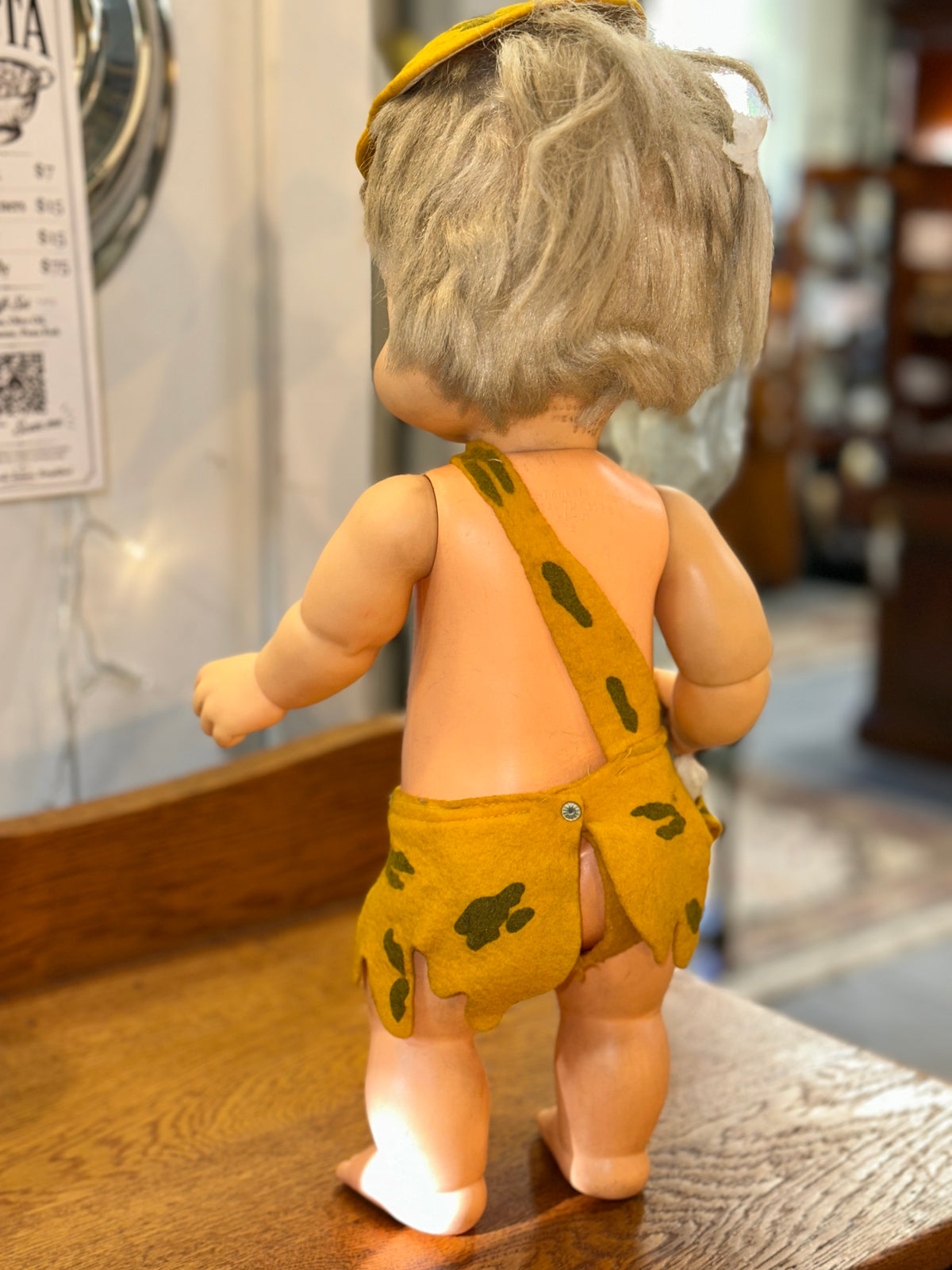 Back of vintage Ideal Toy Corp Bamm-Bamm doll with Hanna-Barbera manufacturer marking
