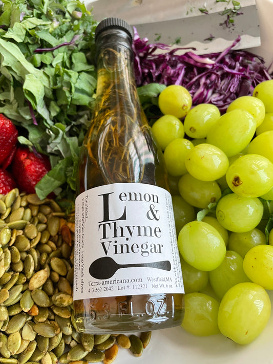 Artisan lemon thyme vinegar with fresh lemon and thyme - gourmet herbal vinegar