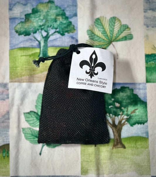 New Orleans-style Coffee & Chicory in a black drawstring bag with a white label