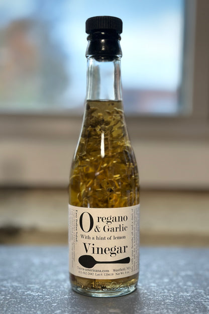 Artisan oregano garlic vinegar with fresh oregano and garlic - gourmet Italian herbal vinegar