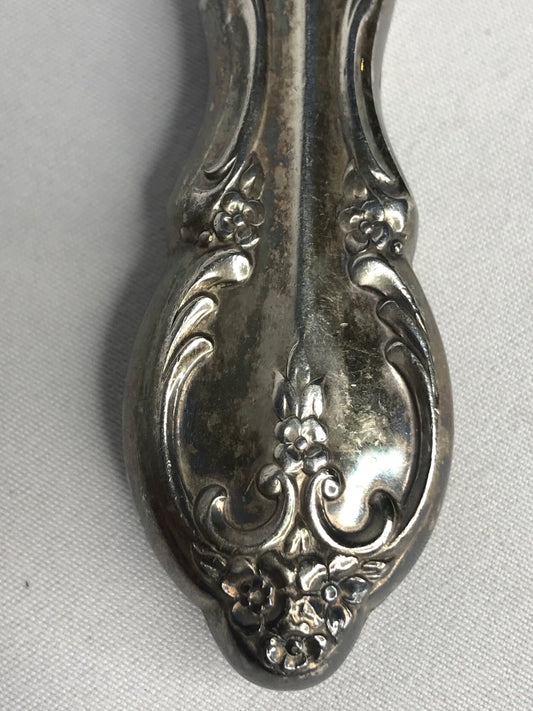 Aged silver plated Hallow knife 10-3/8" scrolls w/flower design