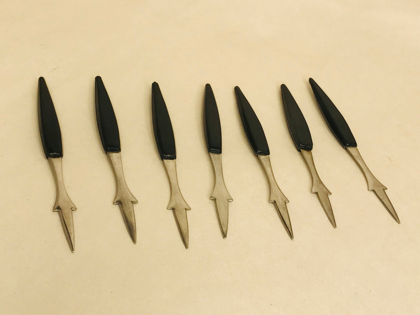 7 vintage mid-century cocktail hors d' oeuvres forks/stainless