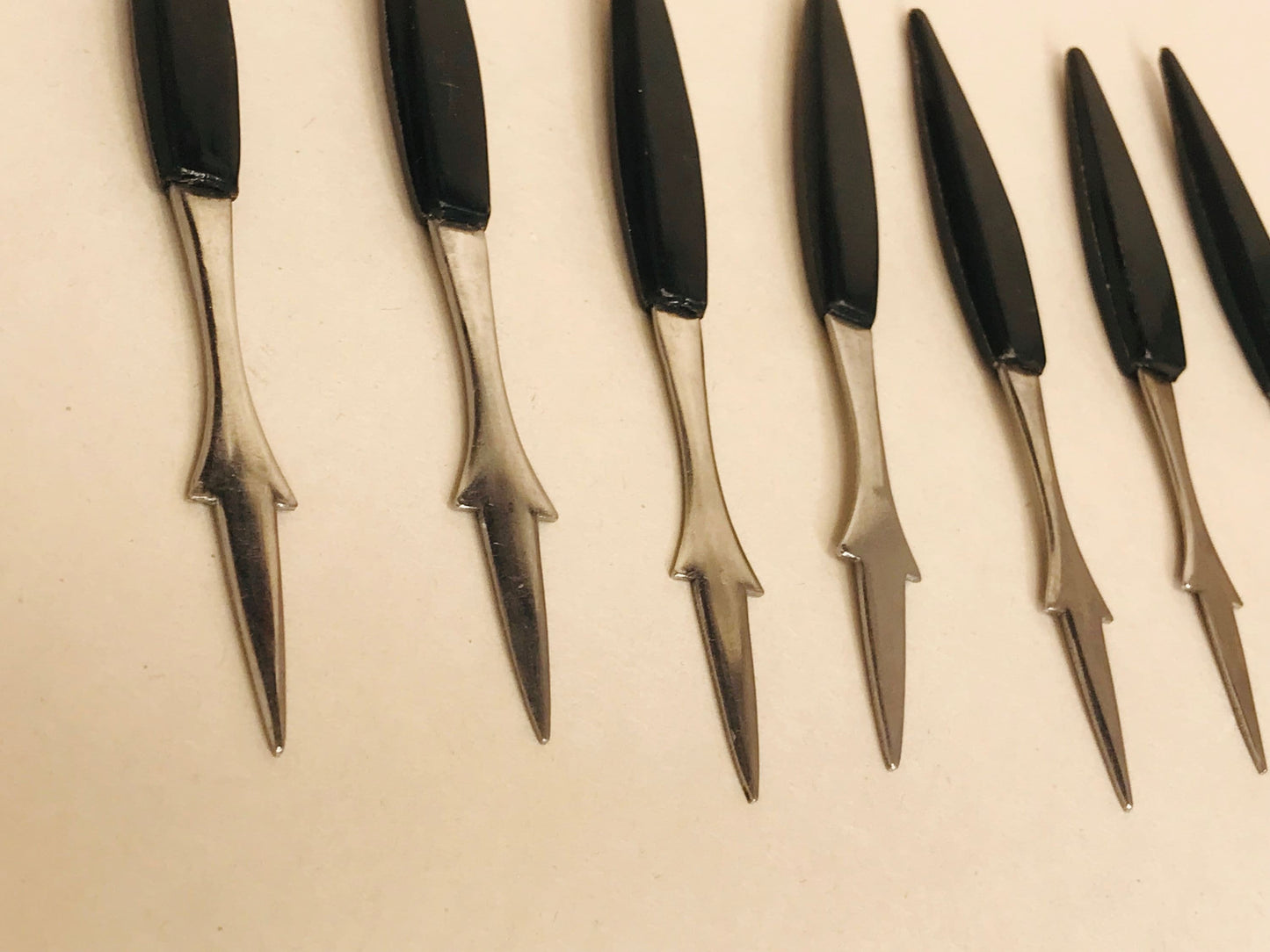 7 vintage mid-century cocktail hors d' oeuvres forks/stainless