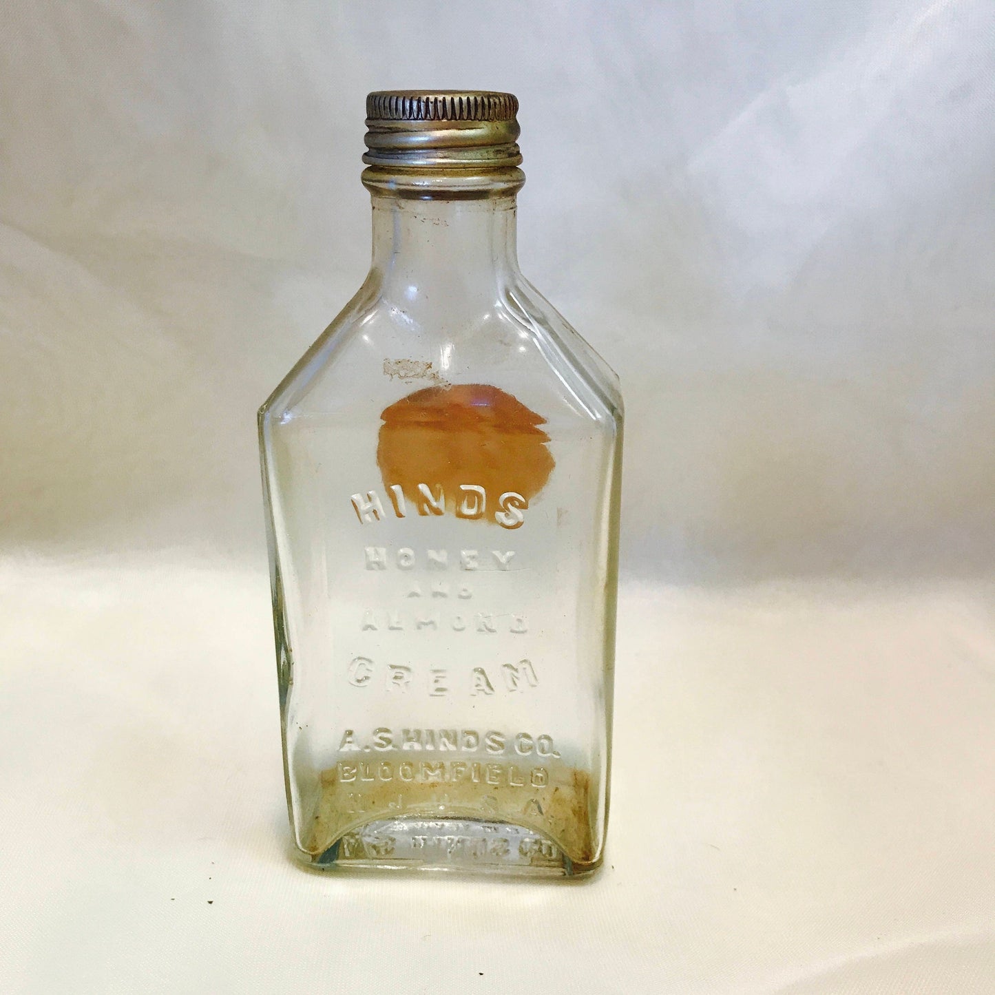 Vintage 1920's a.s. hind's embossed honey and almond cream bottle