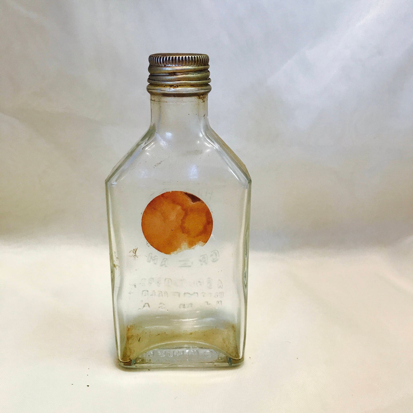 Vintage 1920's a.s. hind's embossed honey and almond cream bottle