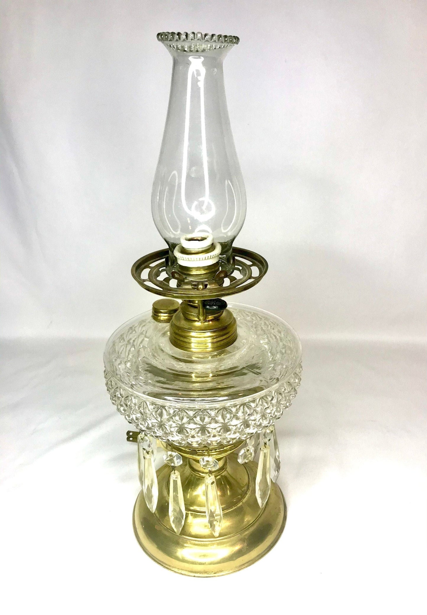 Vintage brass & glass oil/kerosene lamp with hurricane shade modified to electric