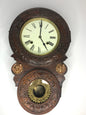 Vintage handmade wooden wall clock with pendulum