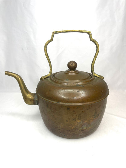 Old-Fashioned Copper Tea Kettle with decorative metal handle