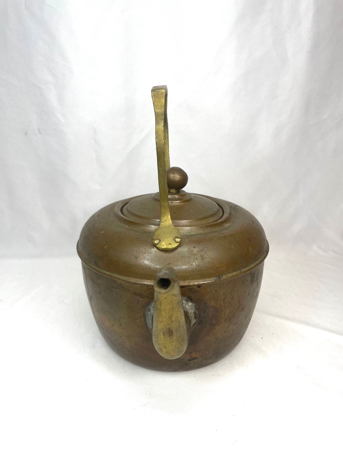 Old-Fashioned Copper Tea Kettle with decorative metal handle