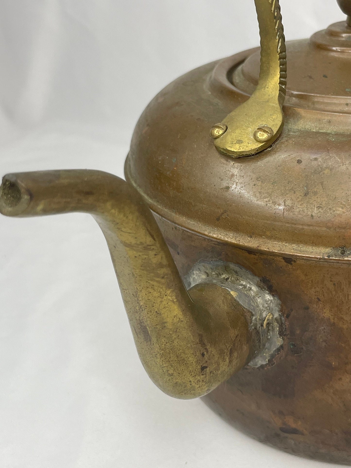 Old-Fashioned Copper Tea Kettle with decorative metal handle