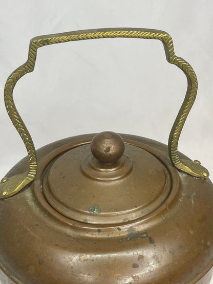 Old-Fashioned Copper Tea Kettle with decorative metal handle