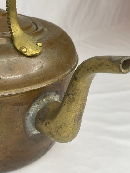 Old-Fashioned Copper Tea Kettle with decorative metal handle