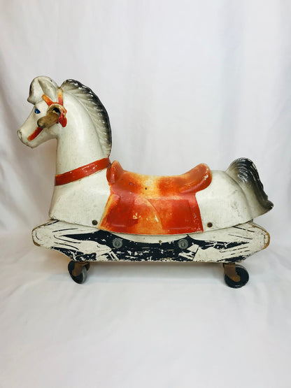 Vintage train-rite child’s plastic & wood hobby horse on wheels