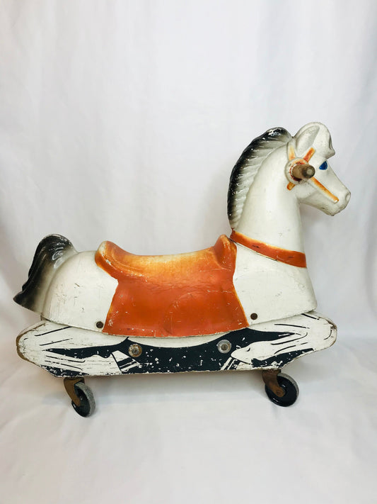 Vintage train-rite child’s plastic & wood hobby horse on wheels