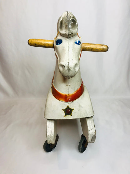 Vintage train-rite child’s plastic & wood hobby horse on wheels