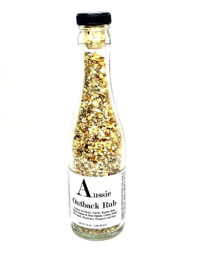 Close-up of Aussie Outback Rub seasoning in a labeled mini glass bottle