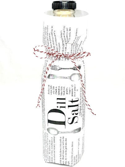 Dill Salt bottle gift-wrapped in printed paper and baker’s twine