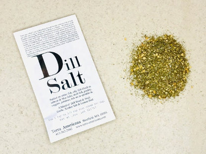 Dill Salt beside a small mound of the herb seasoning blend
