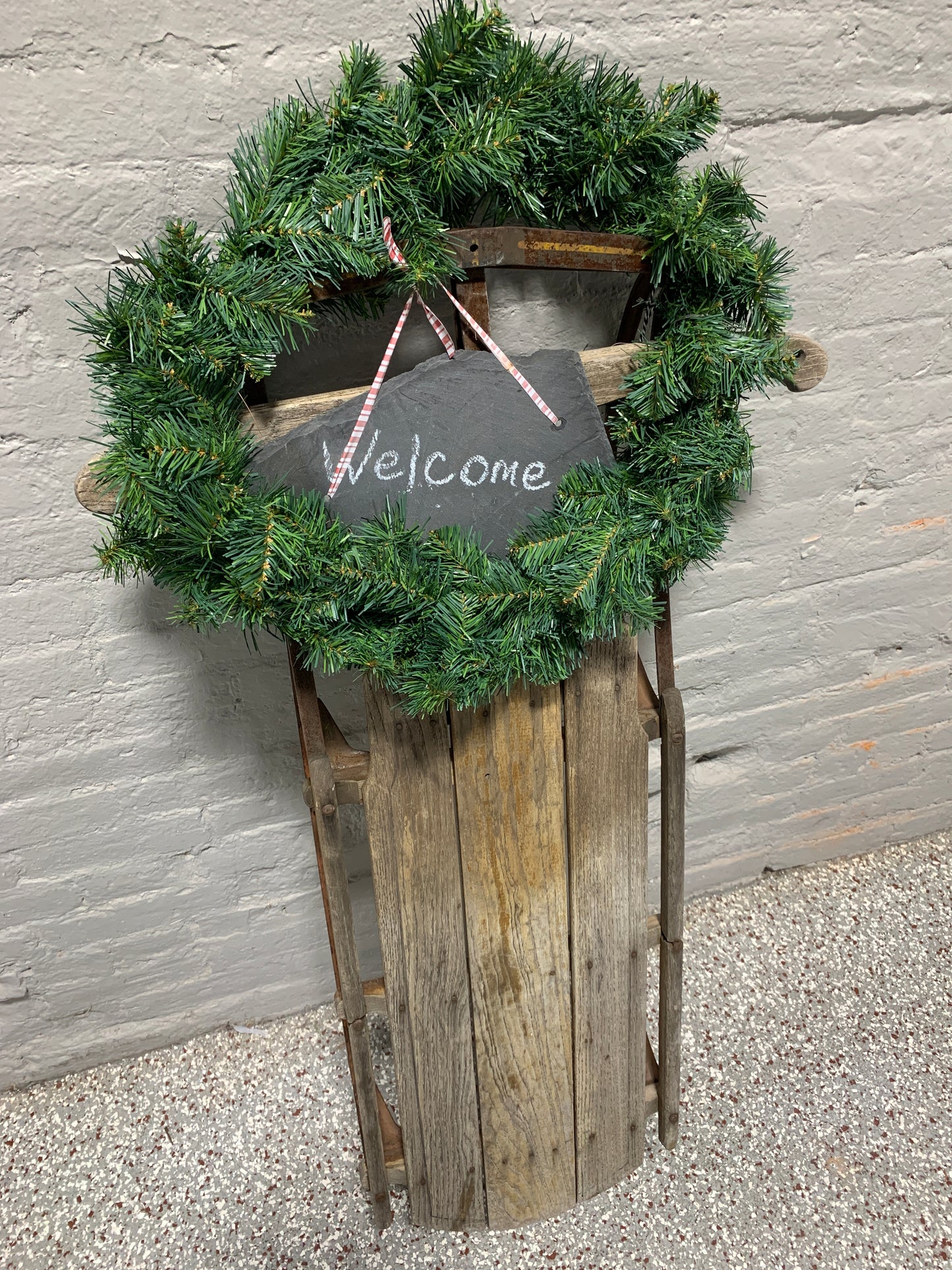 WOODEN SLED WITH WREATH AND WELCOME SIGN