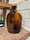 Vintage Log Cabin syrup bottle/flask amber embossed 1776